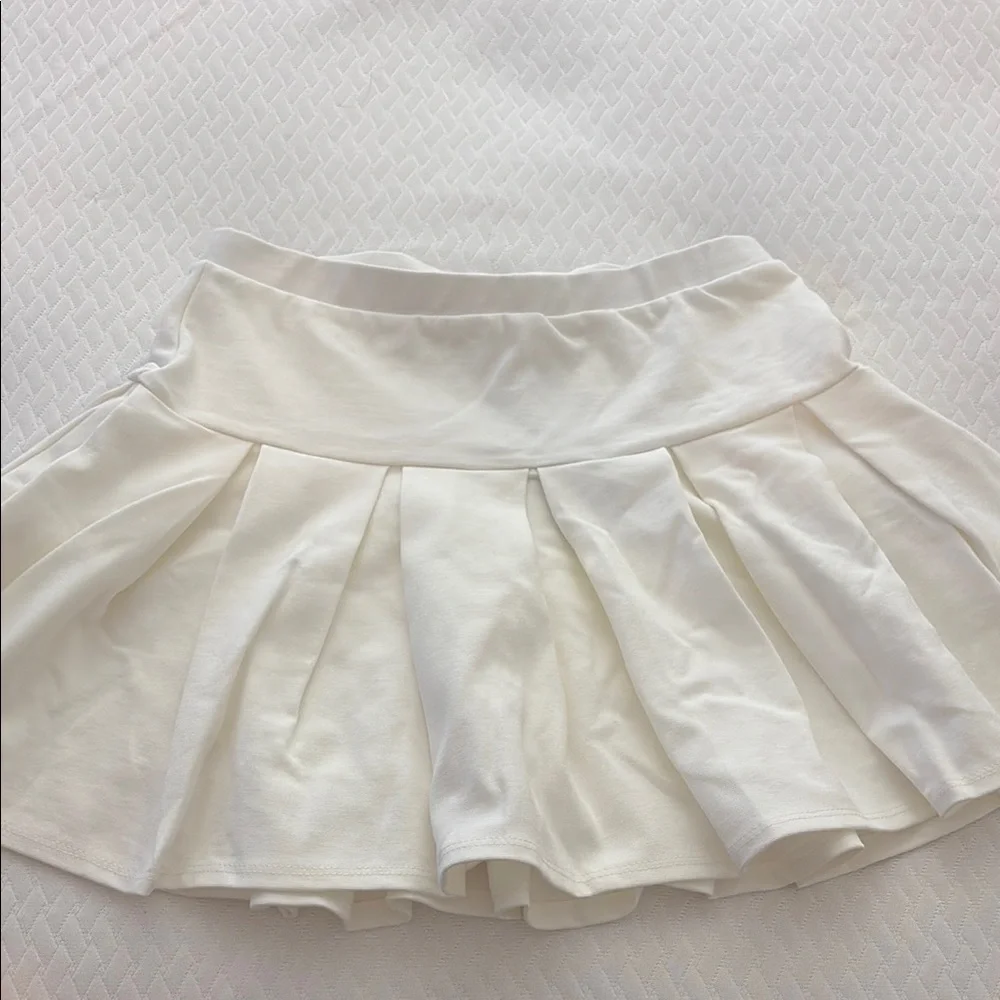 Women’s Fashion Nova “When Good Meets Bad Pleated Mini Skort” in Cream - Size M - Picture 1 of 3